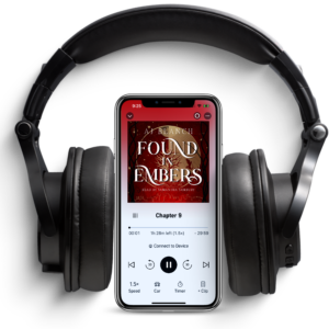 Phone and headphones with the audiobook of Found in Embers on the screen